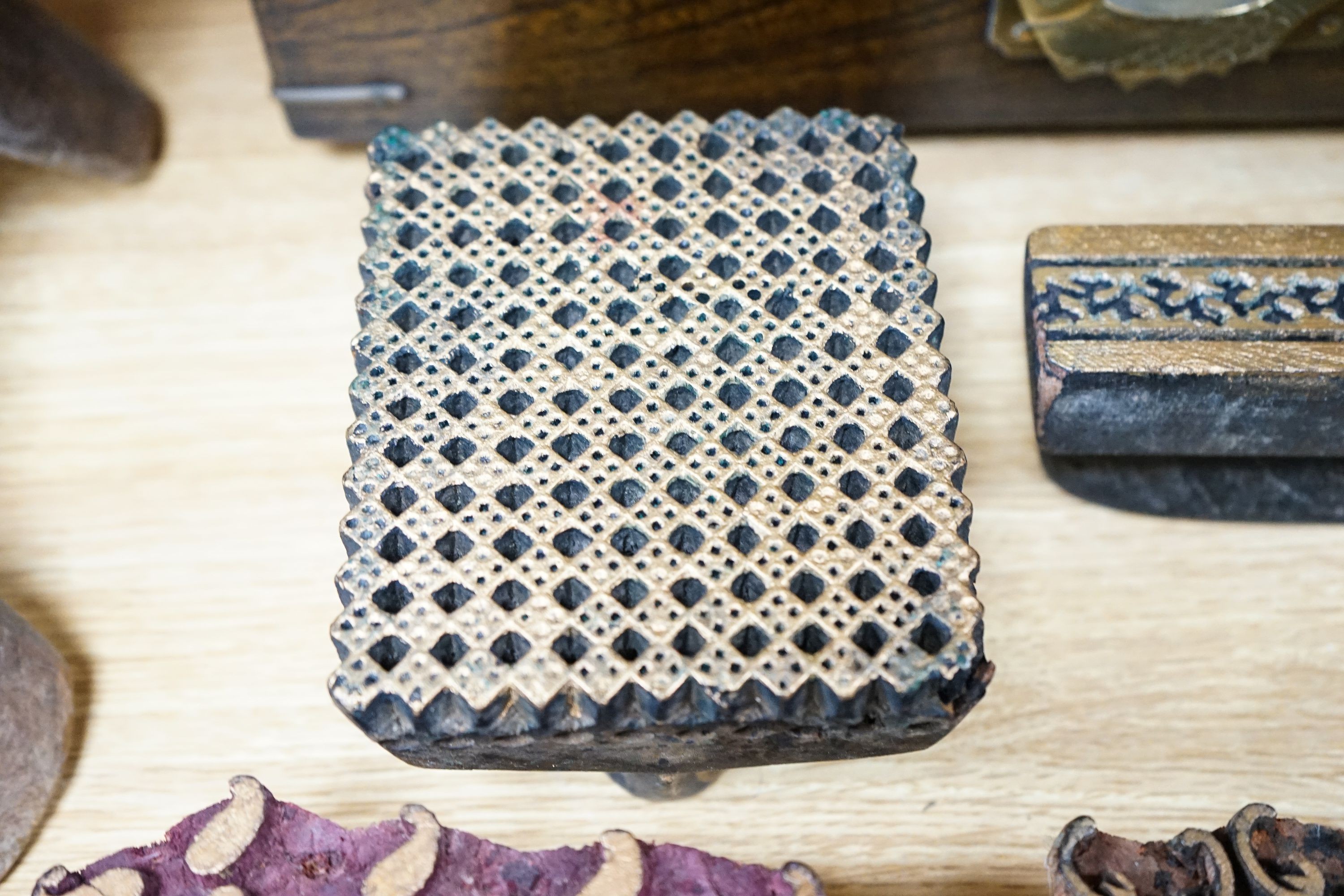 A mixed group of Indian fabric printing blocks and a Chinese wood box, 40.5cm